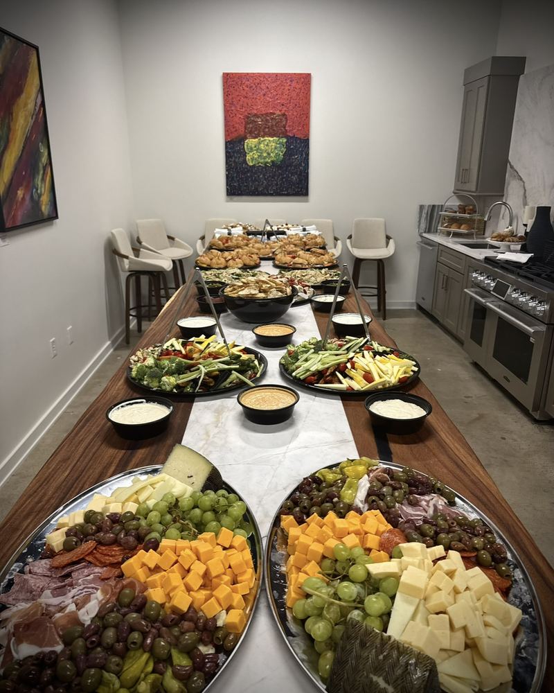 Office lunch buffet with platters and salads