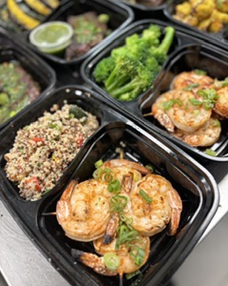 Boxed shrimp, quinoa and broccoli meals
